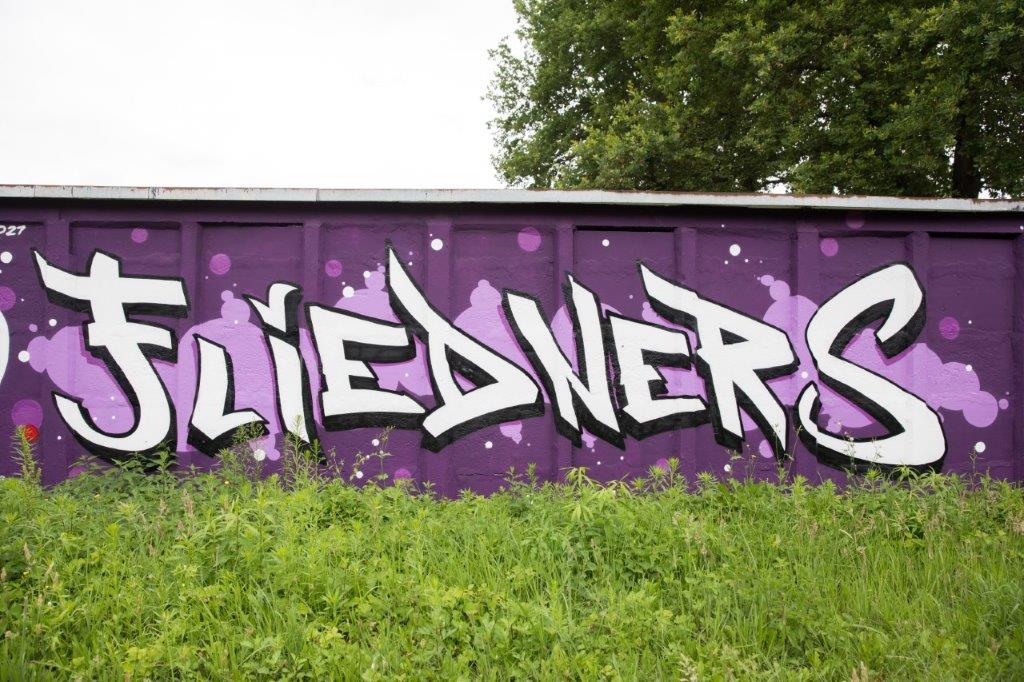 Graffito Fliedners an der Werkstatt Grüne Aue